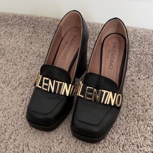 Valentino Black Lug Heel Loafers with Gold Hardware